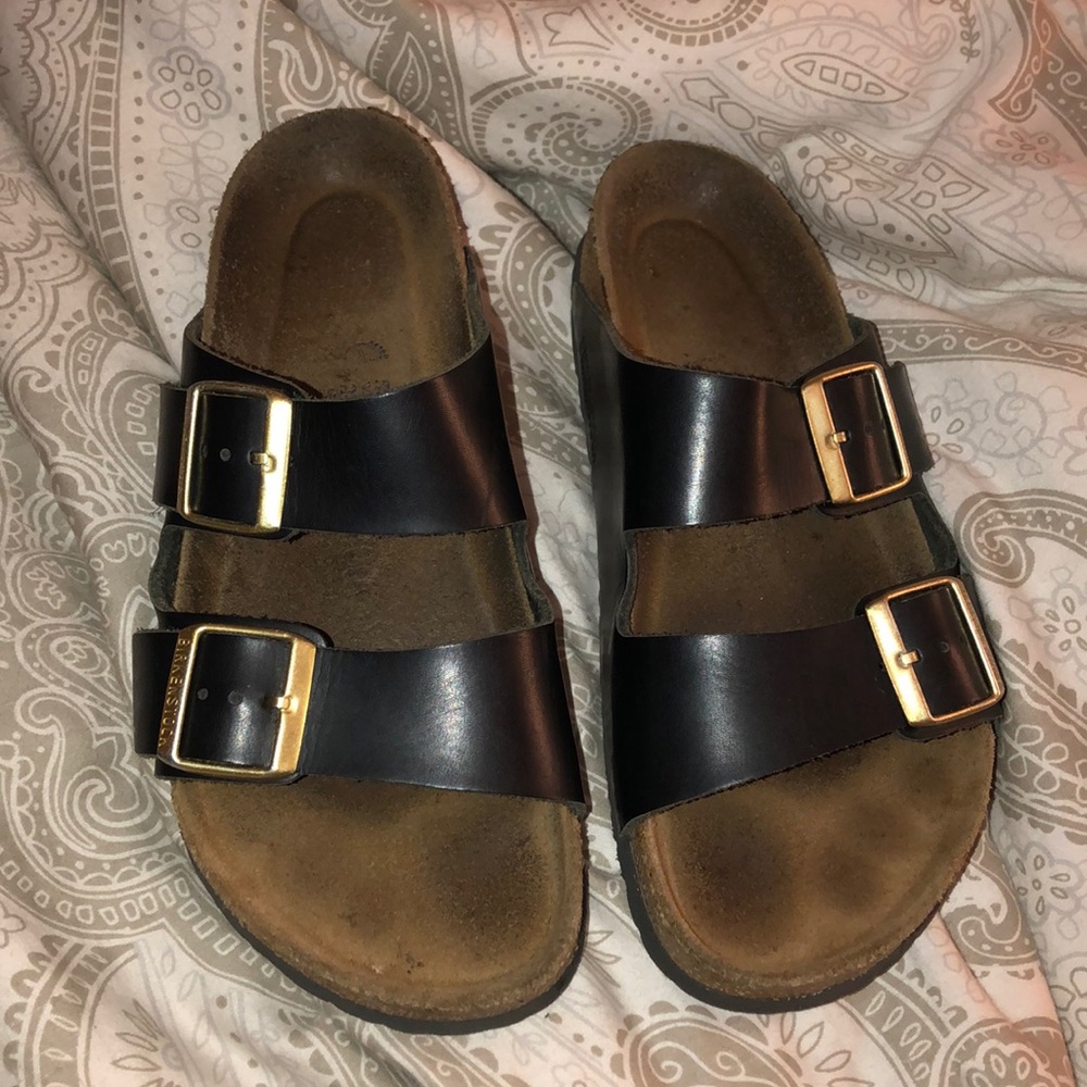 Black leather gold buckle birkenstocks